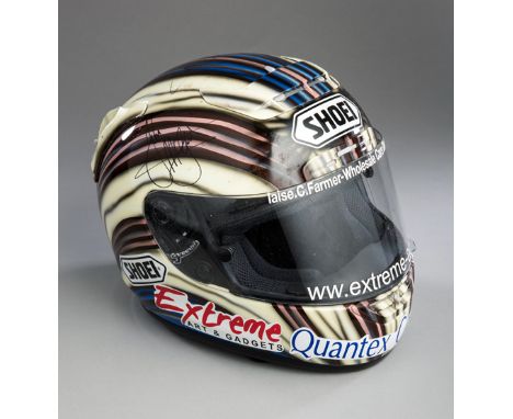 John McGuinness 2008 Isle of Man TT raceworn signed Shoei helmet,
signed three times: on either side and on top, the ventilat