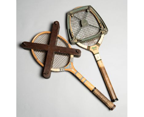 A collection of 17 vintage wooden framed tennis racquets,
all with a concave wedge, together with 14 head presses including a