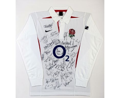 An England rugby shirt fully-signed by the 2003 World Cup winning squad,
31 signatures including Johnson, Wilkinson, Greenwoo