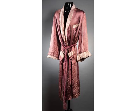 Henry Cooper's Great Britain boxing team gown from the Helsinki 1952 Olympic Games,
in rose coloured silk with white trim, co