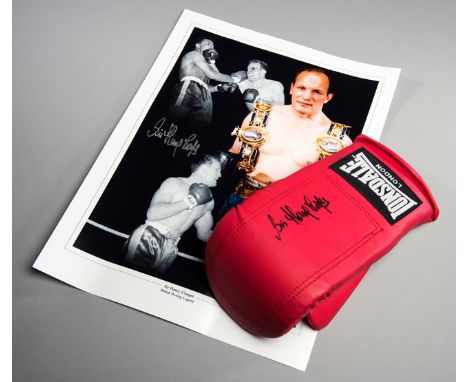A Sir Henry Cooper signed boxing glove,
a red left-hand Lonsdale signed in black marker pen; sold with a Cooper-signed "Briti