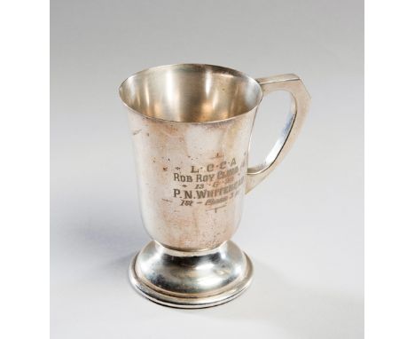 1938 trophy won by Peter Whitehead in his E.R.A. at the Rob Roy Hillclimb in Australia, 
a historic small silver tankard engr