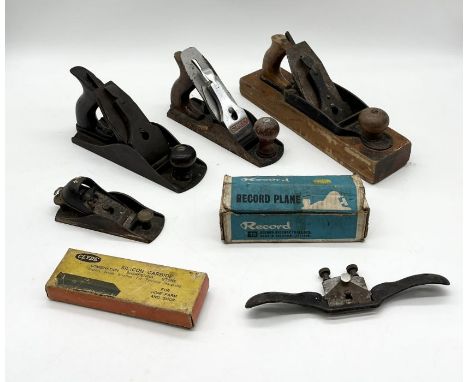 A collection of vintage Stanley and Record planes including a Stanley No. 37 smoothing plane, Stanley No.4, Stanley No. 4 1/2