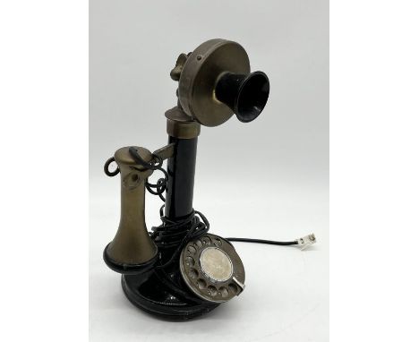 An antique style candlestick telephone