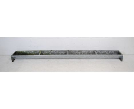 A galvanised metal animal feeding trough - length 273cm, depth 34cm, height 16cm