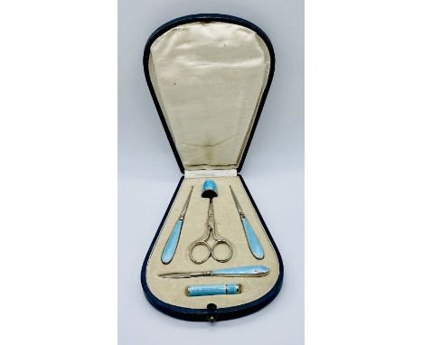 A cased silver and guilloche enamelled sewing set- replacement scissors and damaged to enamel on one piece