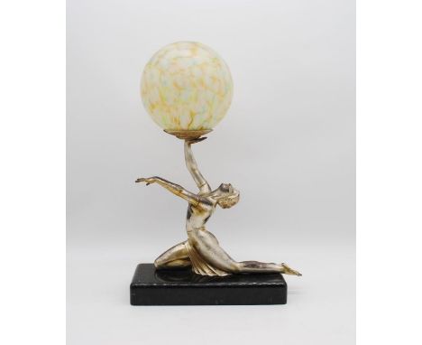 An Art Deco lamp on marble base in the form of a nude lady with mottled spherical glass shade - length 34cm, height 49cm