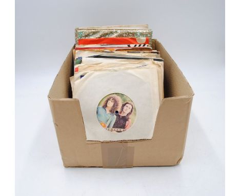 A quantity of 7" vinyl records, including T. Rex, The Rolling Stones, The Beatles, The Everly Brothers, Roy Orbison, The Righ