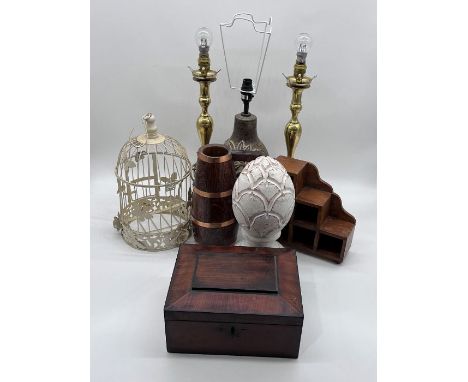 An assorted lot containing three lamps, a wooden casket box, a coopered wooden jug, a wooden finial etc 