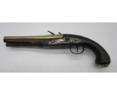 An 18 bore antique flintlock silver mounted livery pistol by Griffin & Tow, circa 1775, brass barrel inscribed 'Griffin & Tow