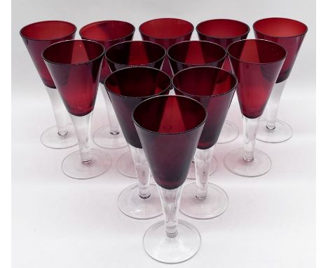 A set of twelve ruby red wine glasses