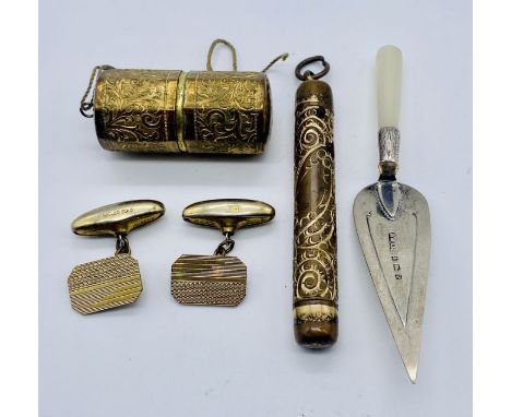 A hallmarked silver trowel shaped bookmark along with a propelling pencil, rolled gold cufflinks etc.