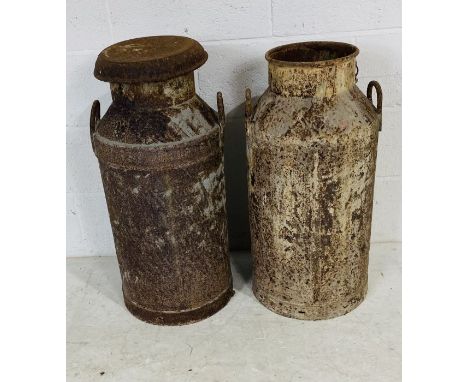 Two vintage weathered milk churns - one missing lid