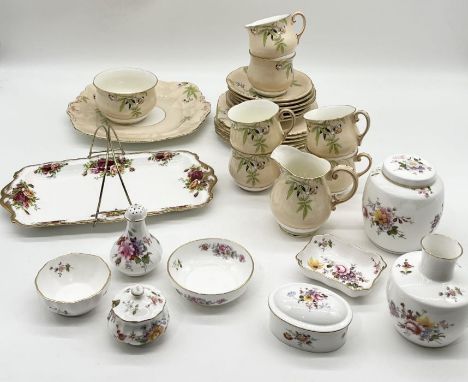 A Paragon tea set comprising of six trios, milk jug, sugar bowl and sandwich plate along with a number of Royal Crown Derby "