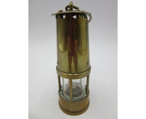 A miniature brass miners lamp, height (excluding hook) 13cm