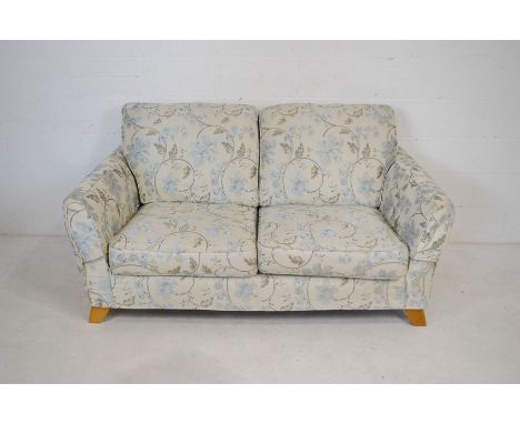 An embroidered two seater sofa - length 170cm