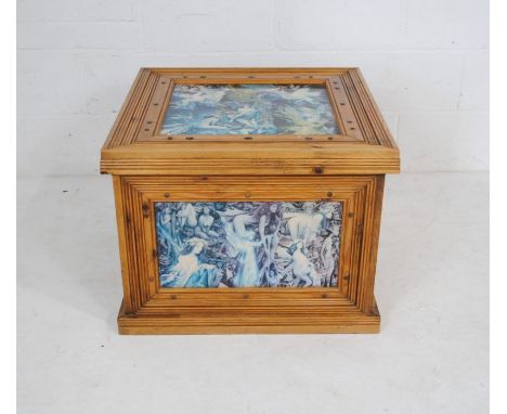 A pine storage trunk, the panels decorated with mythical collages depicting fairies etc. - length 67cm, depth 67cm, height 51