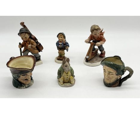 A collection of ceramics including Goebel figures, Beswick Samuel Whiskers, Royal Doulton character jugs ec. 