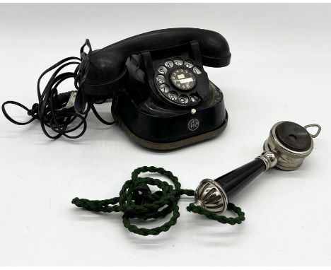 An RTT 56 vintage rotary telephone along with a GEC portable telephone handset