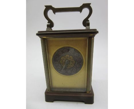 A brass carriage clock with silvered dial (out of position- see photographs)