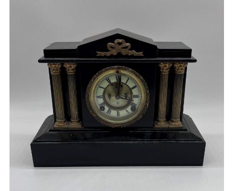 A Victorian slate mantle clock