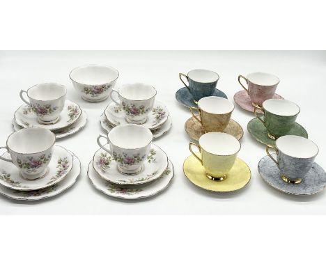 Two Royal Albert part tea sets including six "Gossamer" cups and saucers and four "Moss Rose" trios