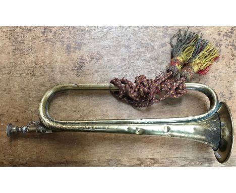 British military bugle with lanyard, possibly Boer War, Made in Paris for A.W. Gamage Ltd of London 