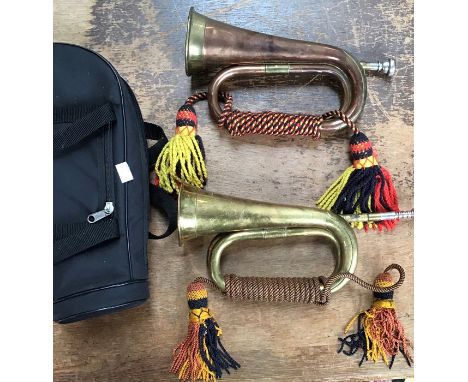 Two British Army Bugles, one by Barratts with military broad arrow the other is by Potters of Aldershot, both have there lany