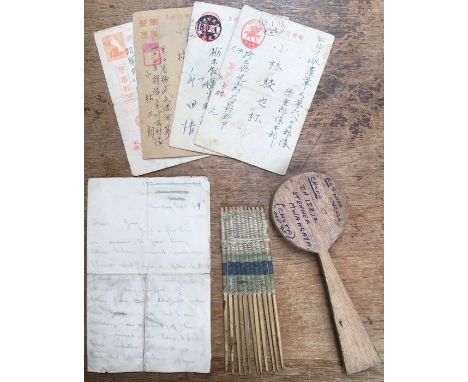 Collection of Far Eastern WW1 & WW2 items.including a hand made British P.O.W hair brush and a locally made hair comb, with a