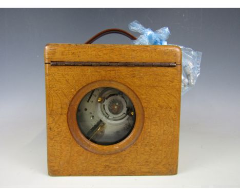 A vintage automatic timing clock company pigeon clock