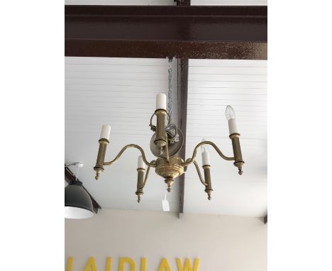 A contemporary brass five-branch ceiling light