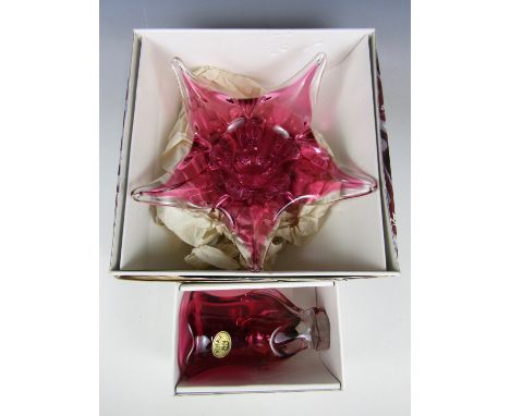 A Bohemian ruby achromatising studio glass vase together with a table centrepiece in original packaging