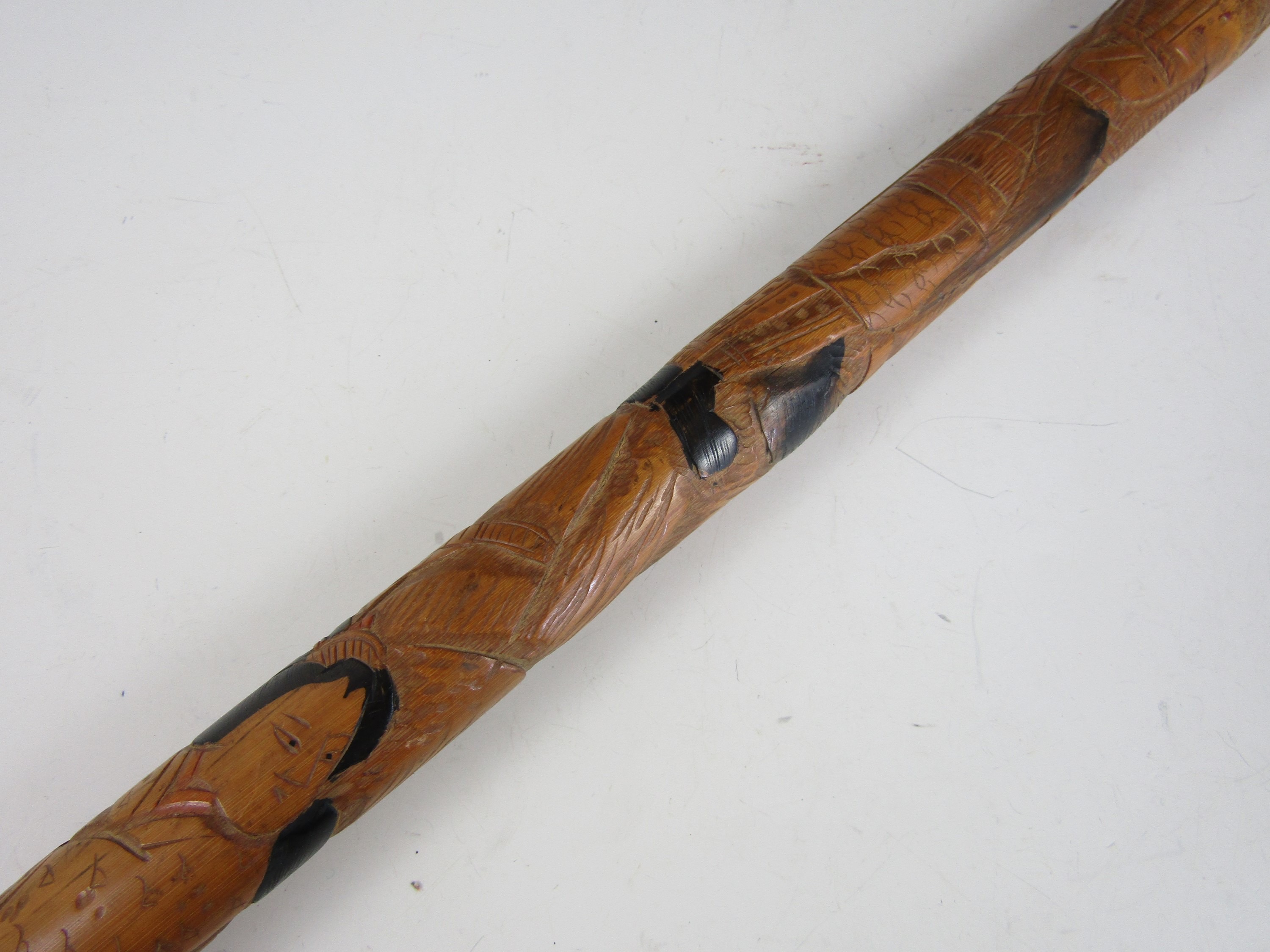A Meiji Japanese carved bamboo walking cane