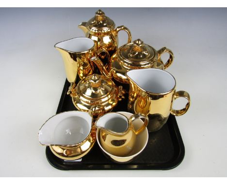 A Royal Worcester gold lustre tea set