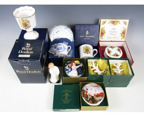 A quantity of boxed ceramics including a Royal Doulton Darling figurine, Royal Worcester cups and saucers and Crown Staffords