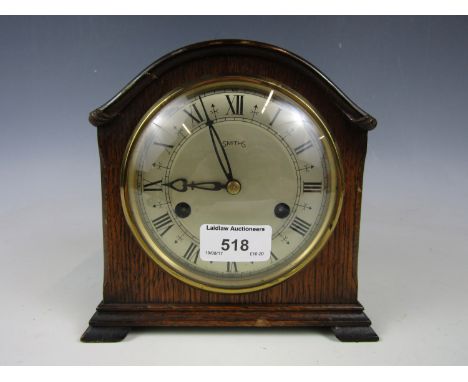 A mid-20th Century Smiths oak mantel clock