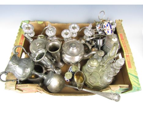 A quantity of electroplate including teapots, a pair of candelabras, trophy cups, cruets and a ladle etc