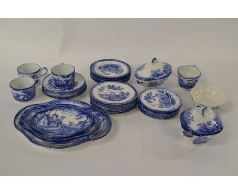 A Ridgeways Humphrey's Clock miniature tea set including three cups, various saucers, small shaped casserole, two covered tur