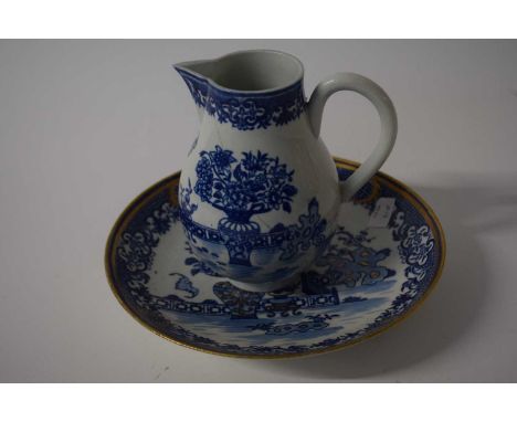 An 18th Century Worcester porcelain dish decorated in blue and white with the bat pattern, disguised Chinese numeral mark to 