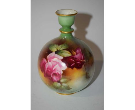 A Hadley Worcester vase of globular form, painted with roses, 15cm high