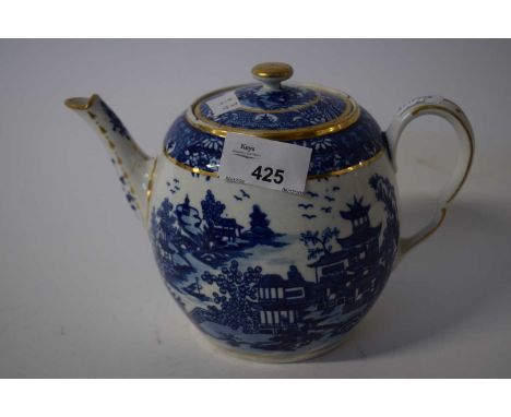 An 18th Century Worcester tea pot, barrel shape with ear handle with printed blue and white design (cover repaird)