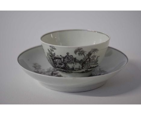 A Worcester tea bowl and saucer, printed with the L'Amour pattern (hairline to saucer)