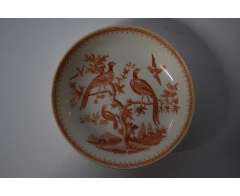 A rare 18th century saucer probably Bow or Worcester printed in brick red with birds in branches. Provenance label to the rev