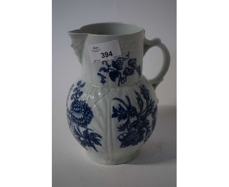 A Worcester cabbage leaf moulded mask jug with a print of chrysanthemums, 18cm high