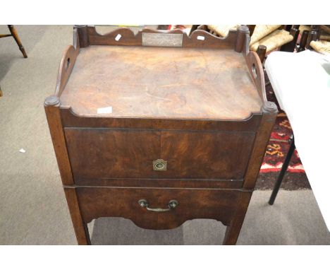 A Georgian mahogany night cupboard with galleried top, hinged door and a pull out base section now converted to a baize lined