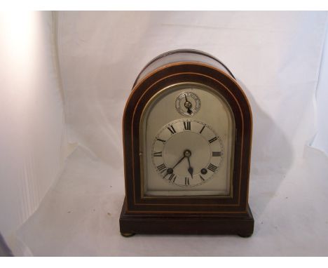 An early 20th century Mantle Clock with steel dial and slow/fast ring, German movement, quarter striking on two gongs, in an 