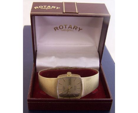 A Gentleman's Rotary automatic Wristwatch, the square champagne dial with date aperture and baton numerals in a 9ct gold case