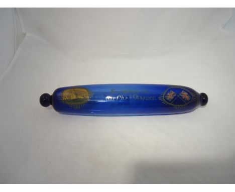 A 19th century blue glass Rolling Pin painted with a ship and union flags, and inscribed "Success to Sir Chas. Napier", 12" (