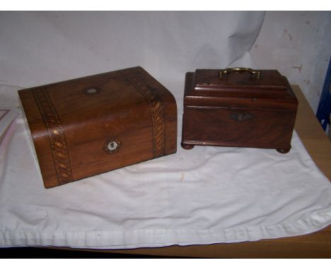 A 19th century mahogany sarcophagus shaped Tea Caddy, 9 1/2" (25cms) wide (a/f), and a Victorian walnut Jewellery Box, 12" (3