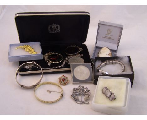 A silver gilt Bangle, an engraved silver Bangle, various coin Pendants and costume jewellery, etc.